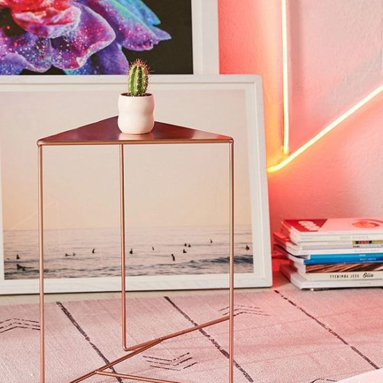 Simple bronze triangle nightstand from Urban Outfitters.