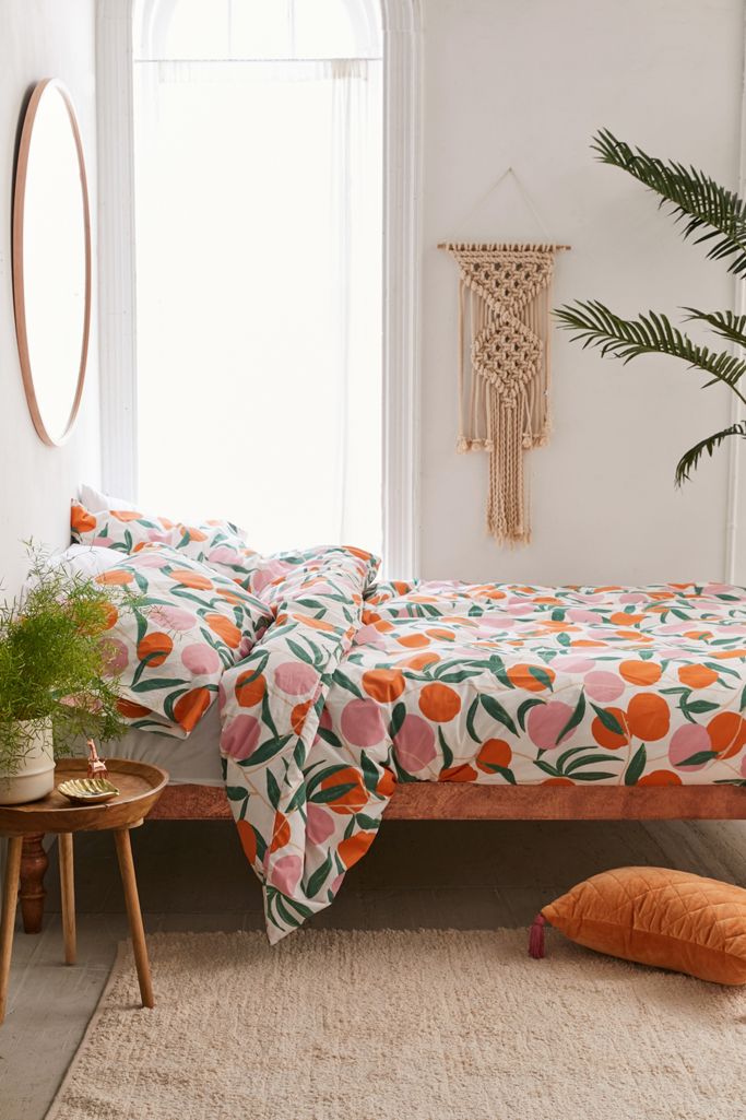 Orange and green dorm room from Urban Outfitters