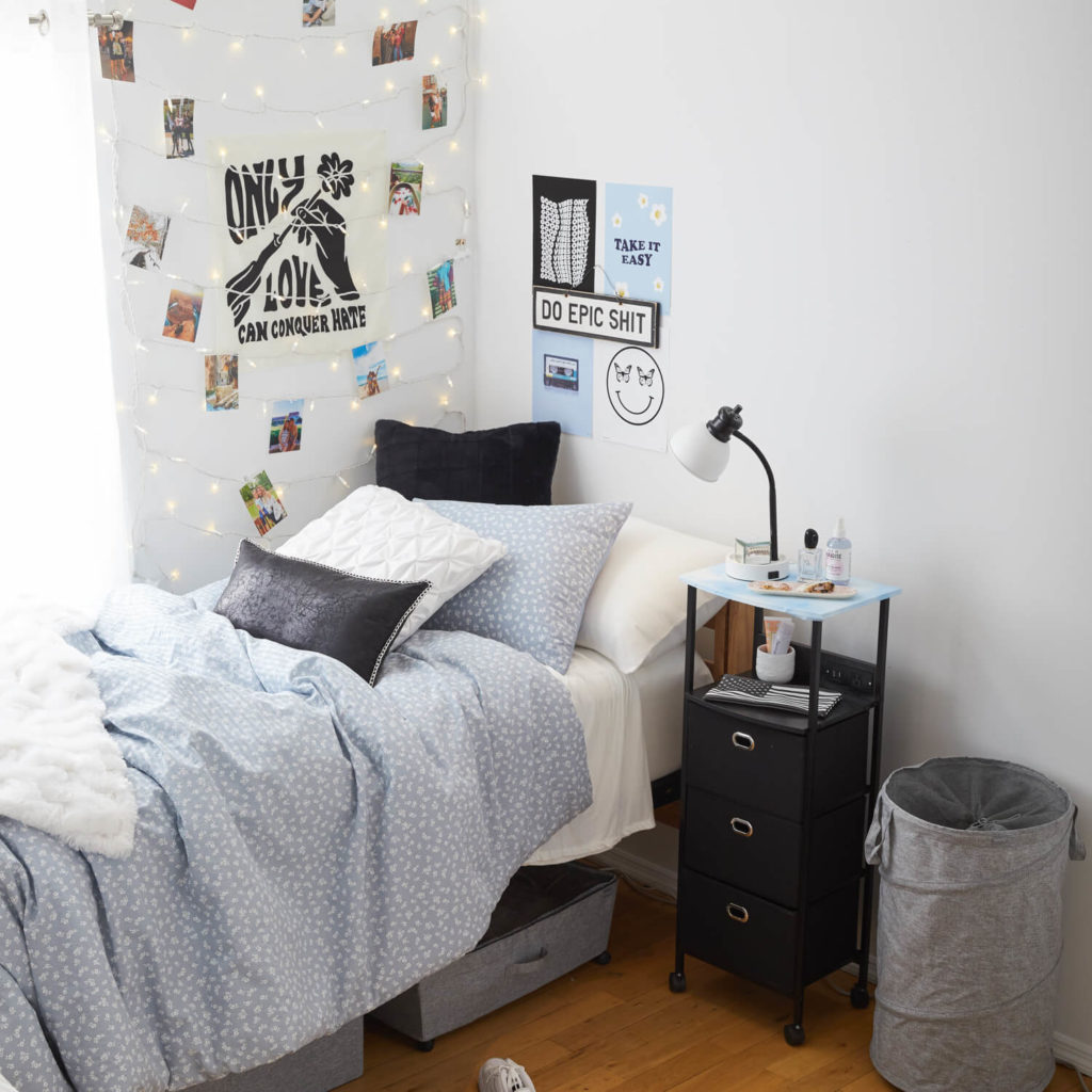 Blue, black and gray dorm room from Dormify
