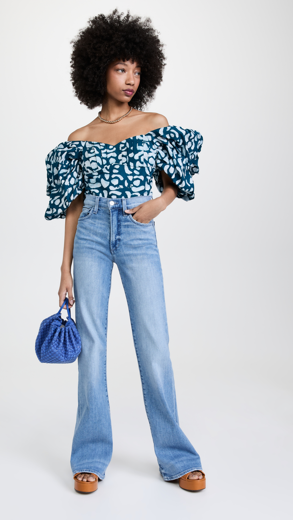 The Best Flare Jeans Outfit Ideas You'll Obsess Over