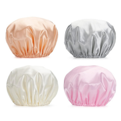 4 pack of shower caps from Amazon in peach, silver, white, and pink
